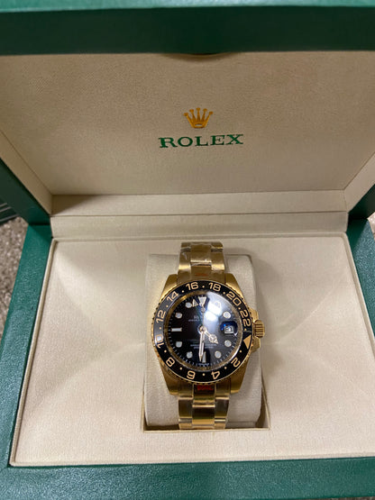 Rolex Oyster Perpetual Date - Gold & Black