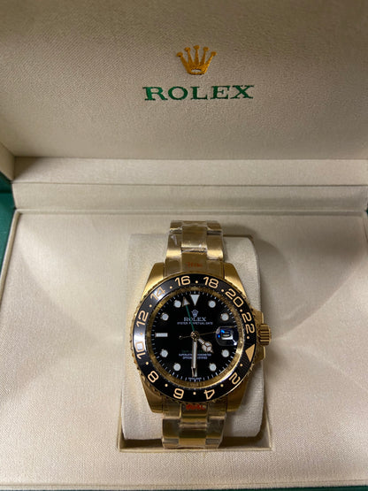 Rolex Oyster Perpetual Date - Gold & Black