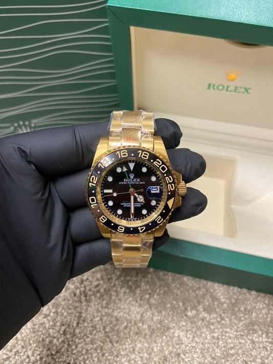 Rolex Oyster Perpetual Date - Gold & Black