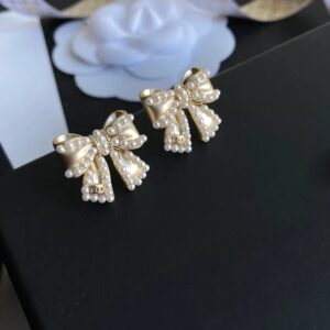 Chanel gold-tone bow earrings